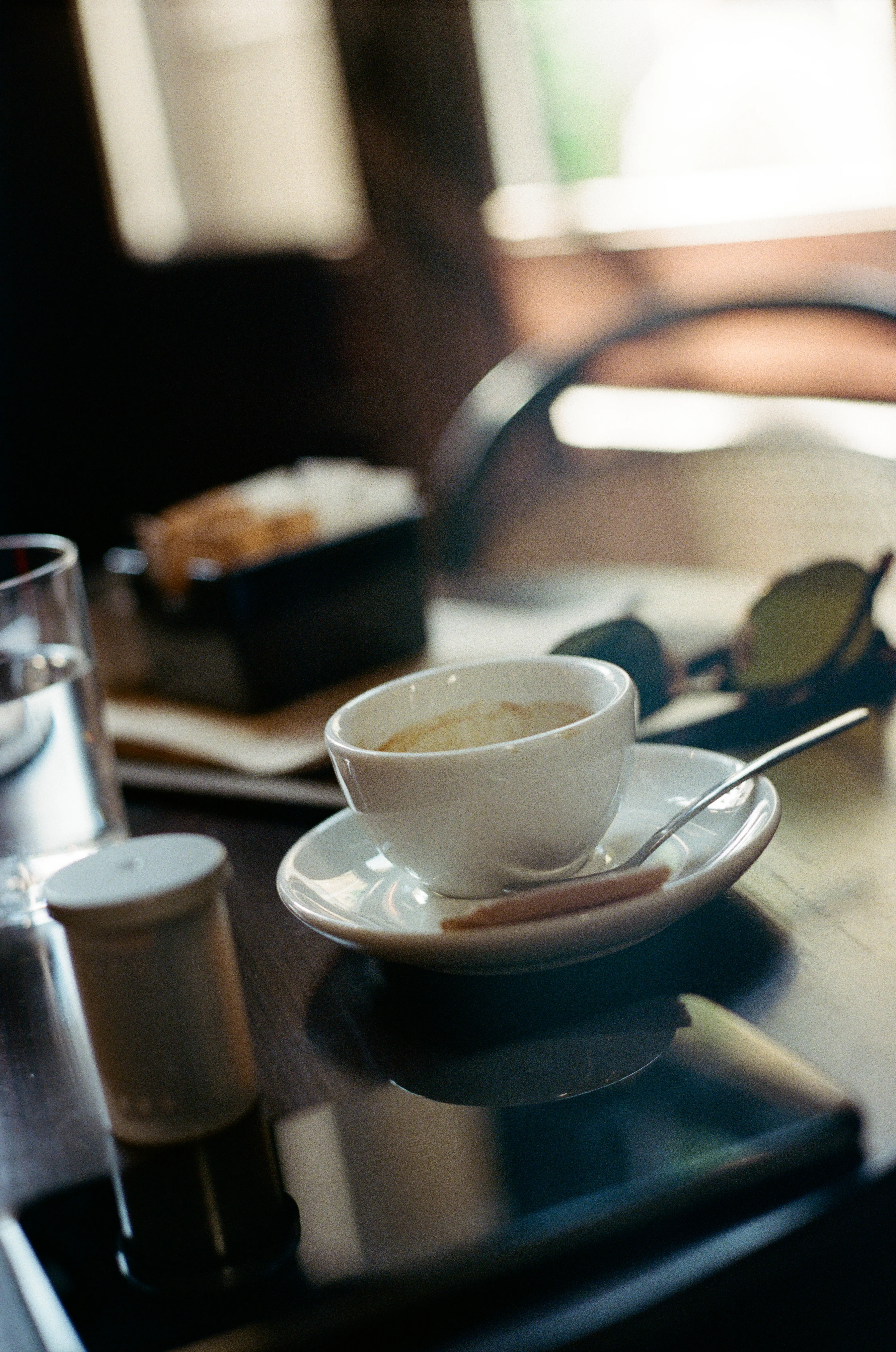 Espresso cup in warm café light