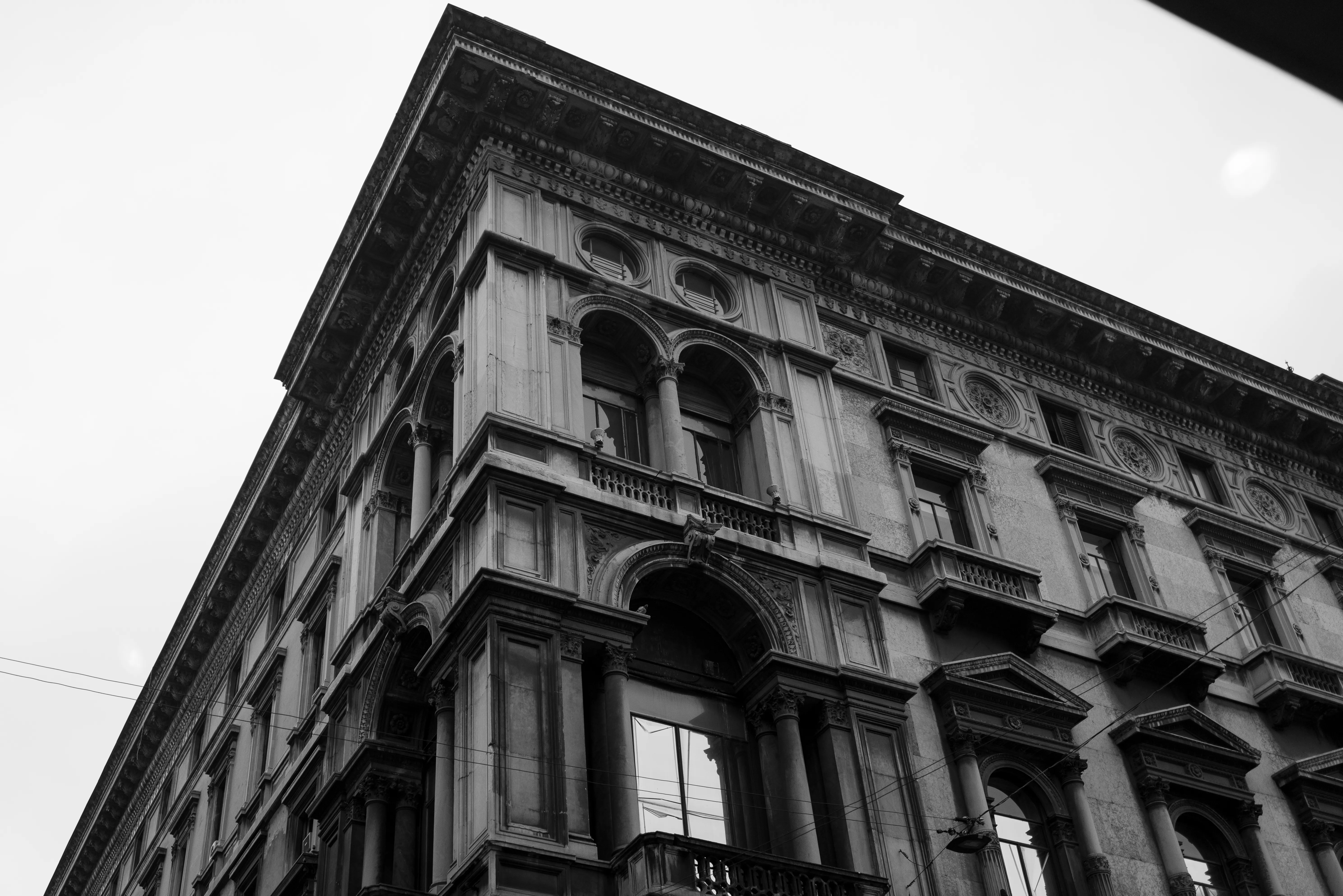 Black-and-white corner of an ornate stone building